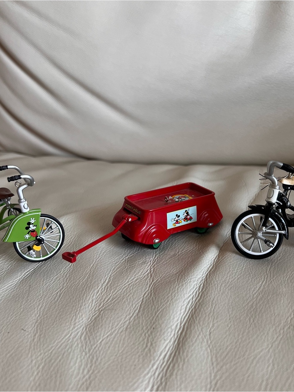 Lot of Miniature Bikes & Classic Red Toy Wagon with Mickey Mouse Graphics